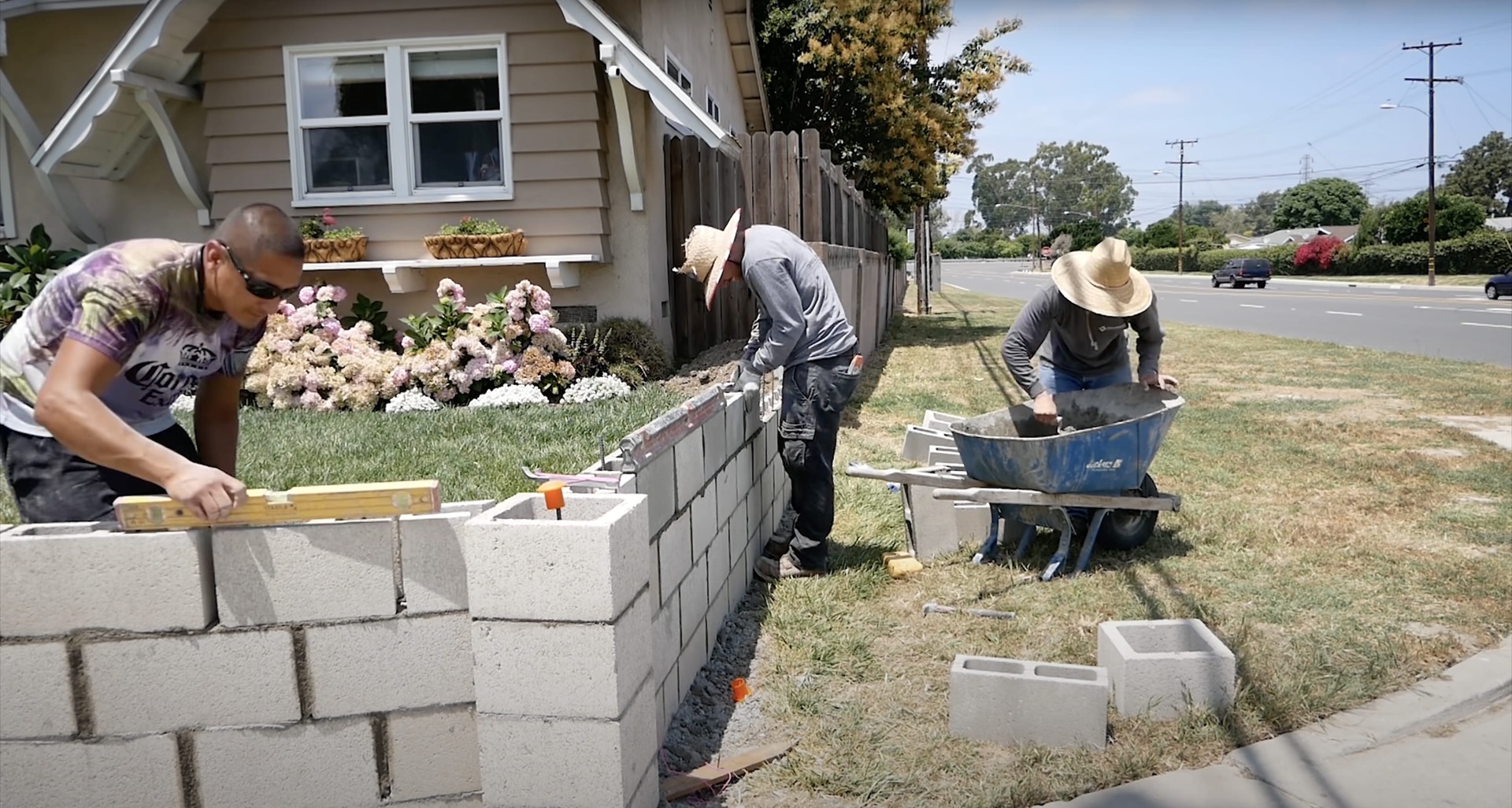 Hudson Concrete Construction team building retaining walls Professional concrete contractors working on retaining wall installation in Hudson, NH