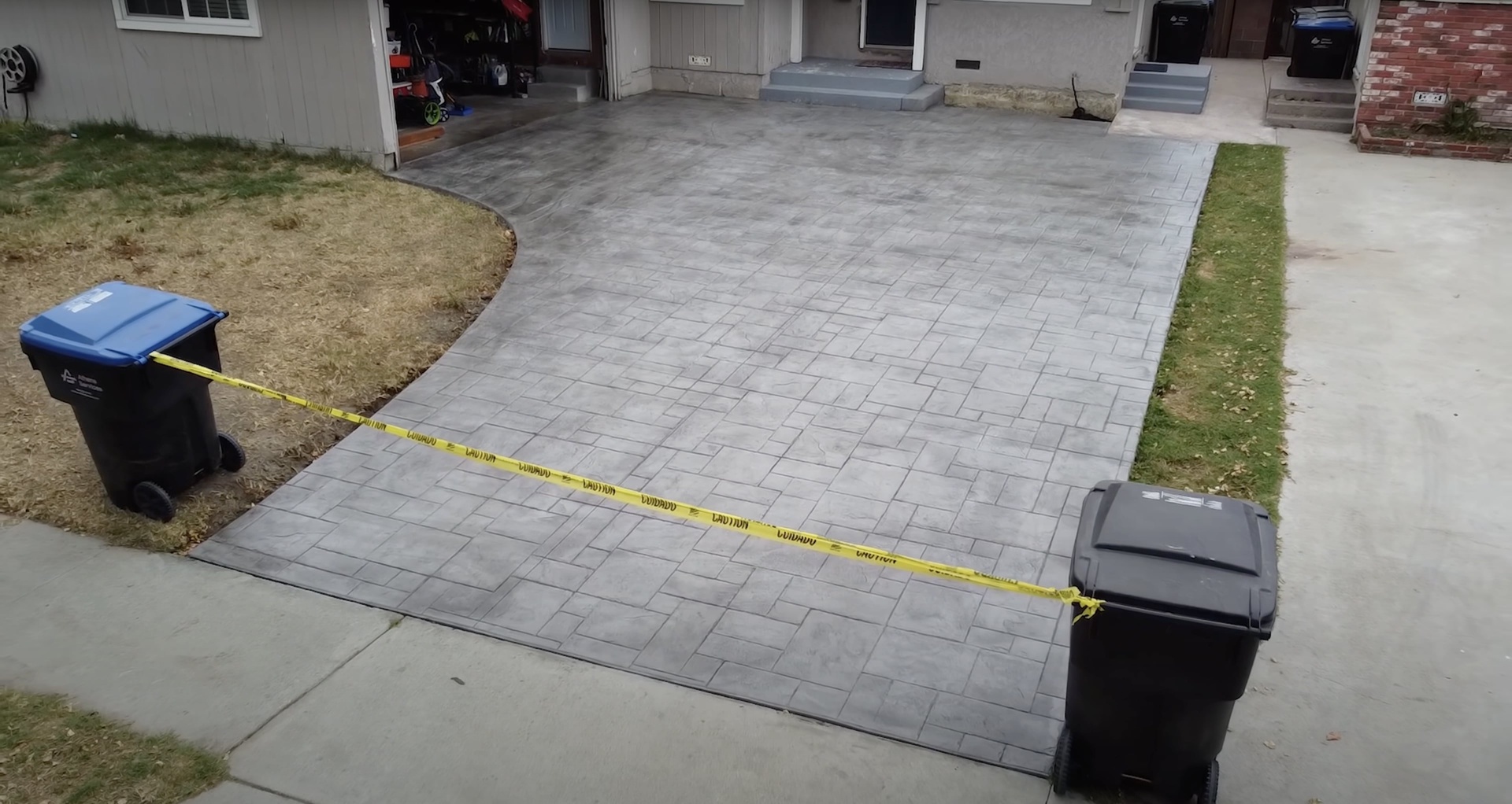 Completed concrete patio project by Hudson Concrete Construction Finished concrete patio installation with professional paver work in Hudson