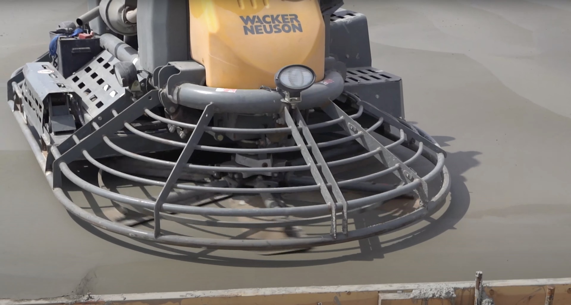 Specialized concrete finishing equipment used by Hudson Concrete Construction Professional concrete equipment including power trowel for smooth finishing