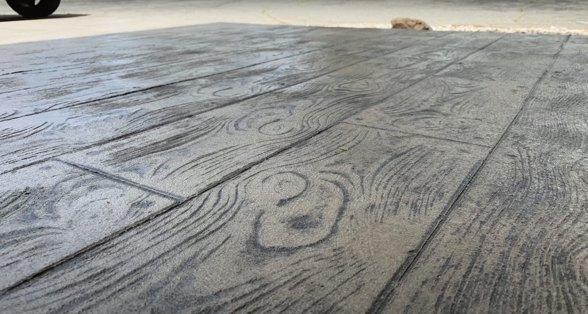 Decorative wood-grain stamped concrete by Hudson Concrete Construction Wood-grain stamped concrete patio with realistic texture finish